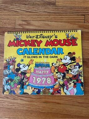 Disney Mickey Mouse Yellow Calendar with Pink Cake and Blue Title Accents